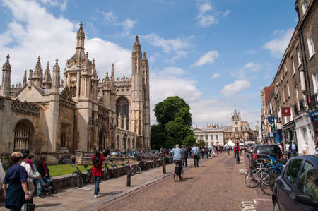 Cambridge, United Kingdom - July 25, 2012: The main square in Cambridge, England. University buildings, brick houses and park bicycles in the city center.のeditorial素材
