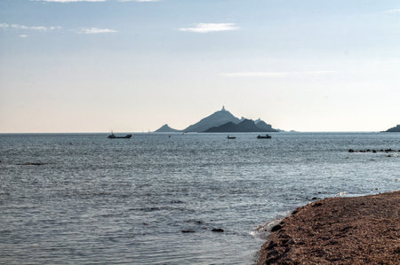 View of the coast and small islands in the sea near Ajaccio, the largest city on the island of Corsica, Europeの写真素材
