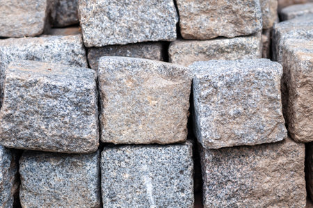 Hard stone cubes stacked on top of each other in a pile