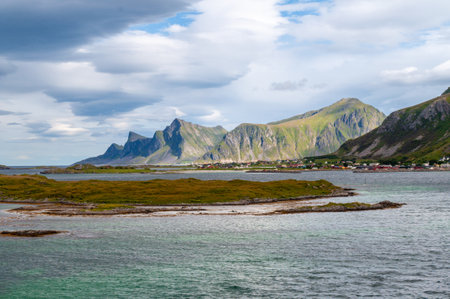 Sea with islands and mountainous coast - Fredvang, Lofoten, Norwayの写真素材