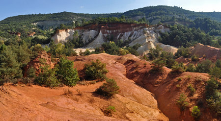 Colorado de Rustrel geological area of red rocks in the south of France. Rocky landscape with red...