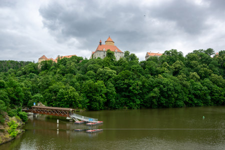 A castle on a hill above the water. Dock for boats at the Brno Dam in the Czech Republic.のeditorial素材