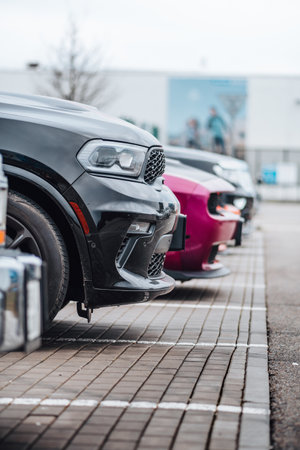 Brno, Czech Republic - December 31, 2023: Several American cars Dodge outside in the parking lot....