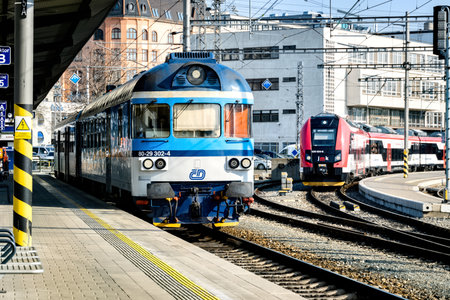 Brno, Czech Republic - March 18, 2024: A blue and white locomotive stands at the railway station...