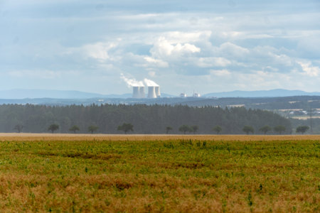 View of the landscape with the cooling towers of the Temelin nuclear power plant in the Czech Republic.のeditorial素材