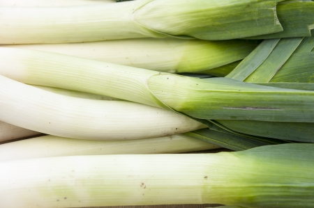 fresh leeks on sale at a farmers market