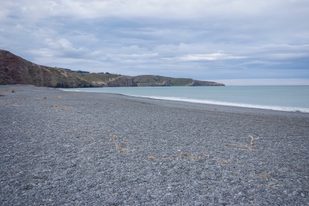 Birdlings flat is a single beach that stretches from Banks Peninuslar to Lake Ellesmere  It is a gravel shingle beach famed for finding semi precious stonesの写真素材