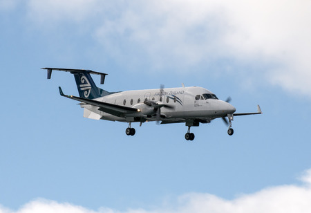 An Air New Zealand Link aircraft, a Beechcraft 1900D prepares to land at Wellington Airport