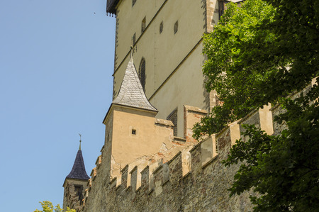 Karlstejn Castle showing some of the architectural details of this 14th century gothic architecture including walls, ramparts, turretsのeditorial素材