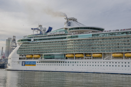 Cruise ship in Galveston Harbour with passengers lining up to watch. Showing the rear section of the ship, Liberty of the Seas for royal caribbean internationalのeditorial素材