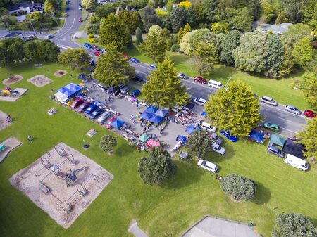 An aerial of The Waikanae sunday market at Park Rd showing the carpark and stalls set up in the parkのeditorial素材