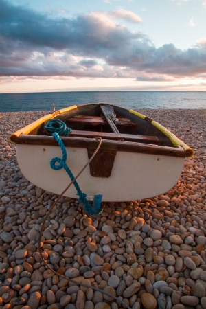 Chesil Beach, Portland, Dorset - Boat looking out towards the seaの写真素材
