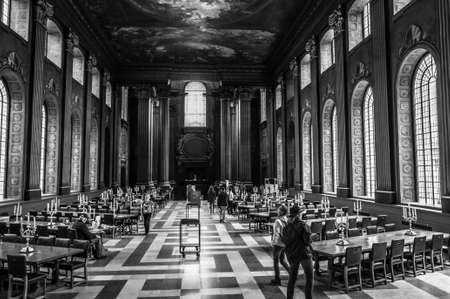 Tourists visiting The Painted Hall a dining hall in the Old Royal Naval College Greenwich London, United Kingdomのeditorial素材