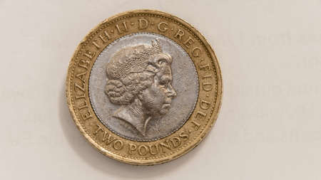 London, United Kingdom, November 30, 2020: Two Pounds Great Britain coin including scrapes, scuffs, blemishes, and imperfections from the weathered 2007 coin. Coin 1807 Slavery. Obverseのeditorial素材