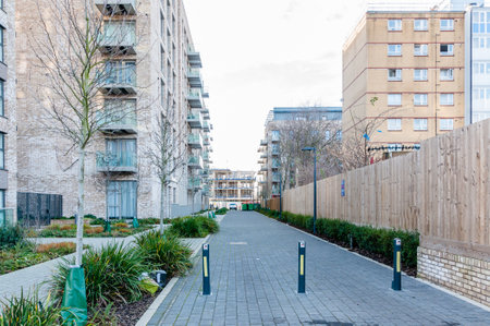 London, United Kingdom, January 04, 2021: New modern apartment block of flats on the Green Street, Upton gardens, former site of West Ham football ground, Upton parkのeditorial素材