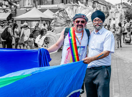 London, United Kingdom, July 2, 2019: People attend the  Forest Gate pride event and show their support for the Gay Pride (Selective Colour)のeditorial素材