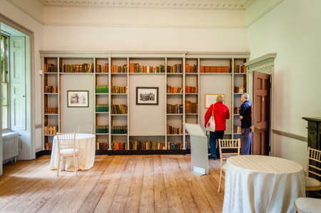 London, United Kingdom, July 19, 2017:   Old books on a shelf in Fulham Palace.のeditorial素材