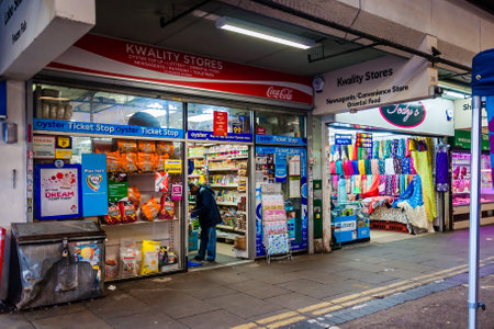 London, United Kingdom - 04 May, 2021: Exterior of Newsagents conveniences store oriental food, Queens Market, Green Street, Newham, East Londonのeditorial素材