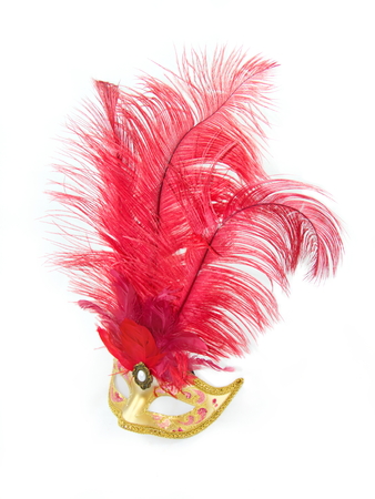 Female Venetian mask -  golden mask with a red featherの写真素材