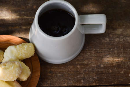 cup with coffee and homemade cookiesの写真素材