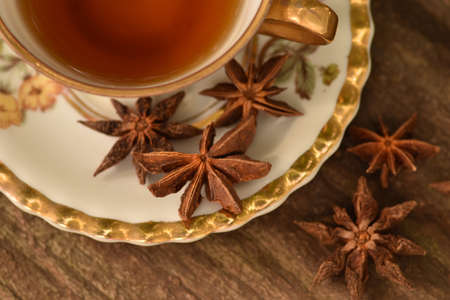 antique cup with star anise teaの写真素材