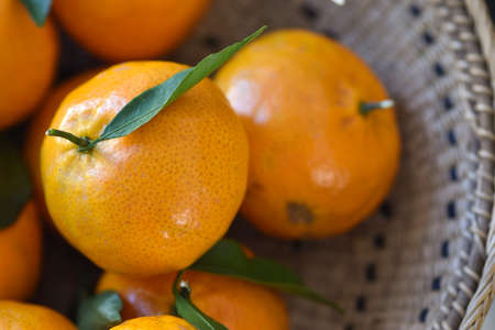 fresh tangerines on gray background. selective focus. Top view. Copy spaceの写真素材