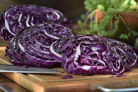 Red cabbage cut into slices outdoorsの写真素材