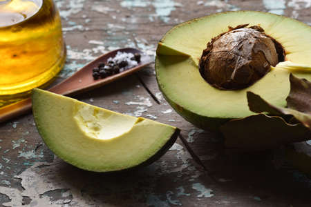 Avocado cut in half. Organic fresh fruit.