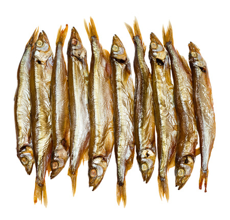 Golden smoked sprats isolated on white backgroundの写真素材