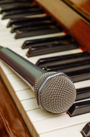 Microphone on the keyboard of classical pianoの写真素材