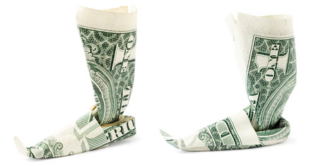 Dollar origami boot isolated on white background. Stock image.の写真素材