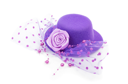 Purple antique ladies hat with flower isolated on white backgroundの写真素材