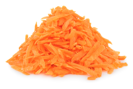 Pile of grated carrot isolated on white background.の写真素材