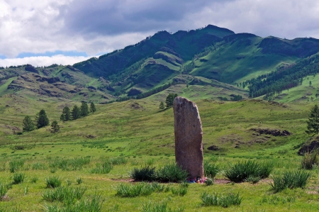 Khakases sacred stone in the green mountain valleyの写真素材