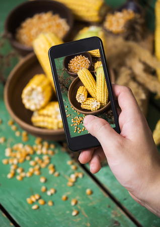 taking photo of food with smartphoneの写真素材