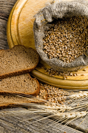 assortment of baked bread on wood tableの写真素材