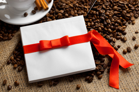 White envelope with a red bowの写真素材