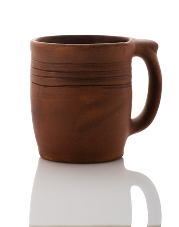 Clay cup on a white background. Isolateの写真素材