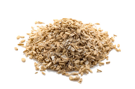 Crumbled raw oatmeal. isolate