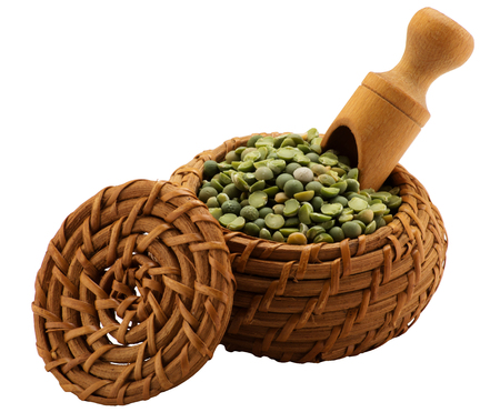 Green peas in a basket. Isolatedの写真素材