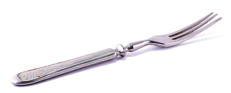 Iron fork on a white background. Isolatedの写真素材