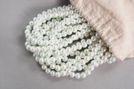 twisted white  pearls on the tableの写真素材