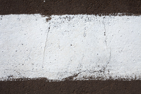 strip of white paint on the pavement. Use as frame or background
