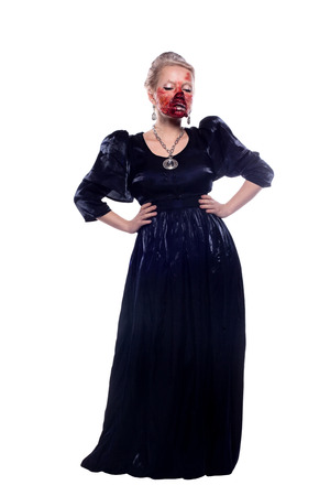 beautiful girl in the image of a zombie isolated on white backgroundの写真素材