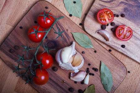 scattered spices on a cutting boardの写真素材
