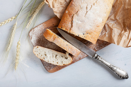 sliced fresh white bread with spices and browned crustの写真素材