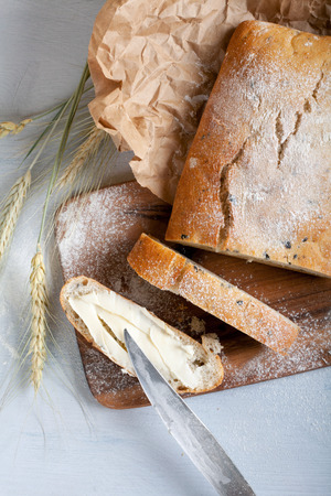 sliced fresh white bread with spices and browned crustの写真素材