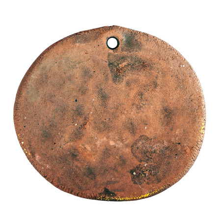 ceramic plate with a hole isolated on white backgroundの写真素材
