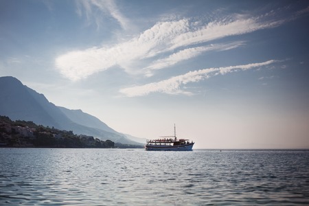 Passenger ship sailing in the sea. Mountain Viewの写真素材
