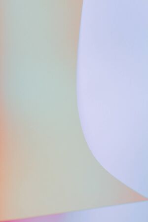Pink and blue abstract paper background from a curved sheet. Blank for website, advertising,...
